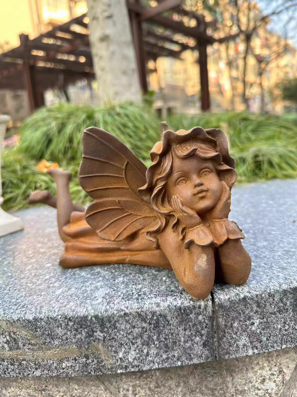 Little angel with chin in hand