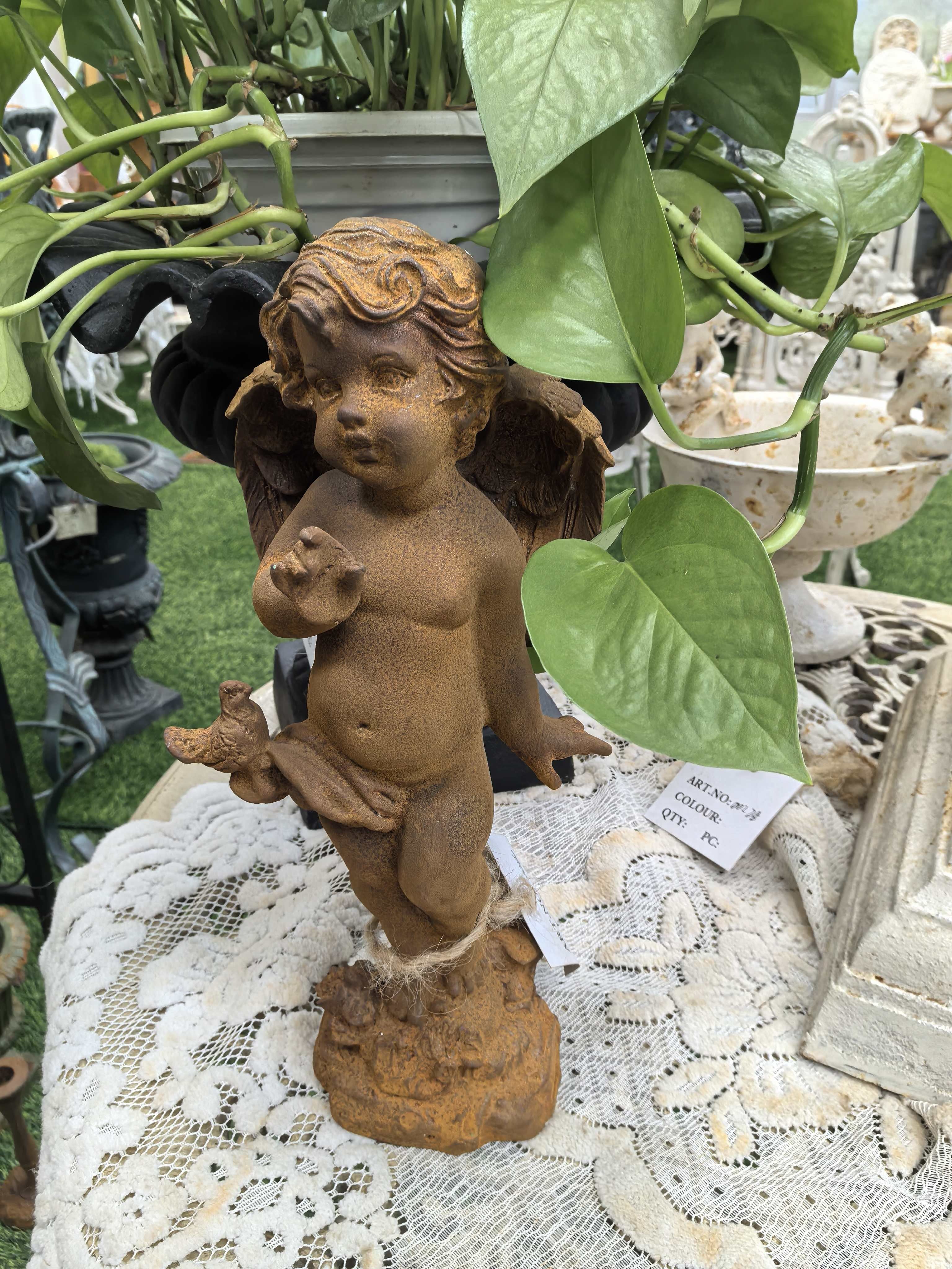 Rust-colored decorations, shy little bird angel