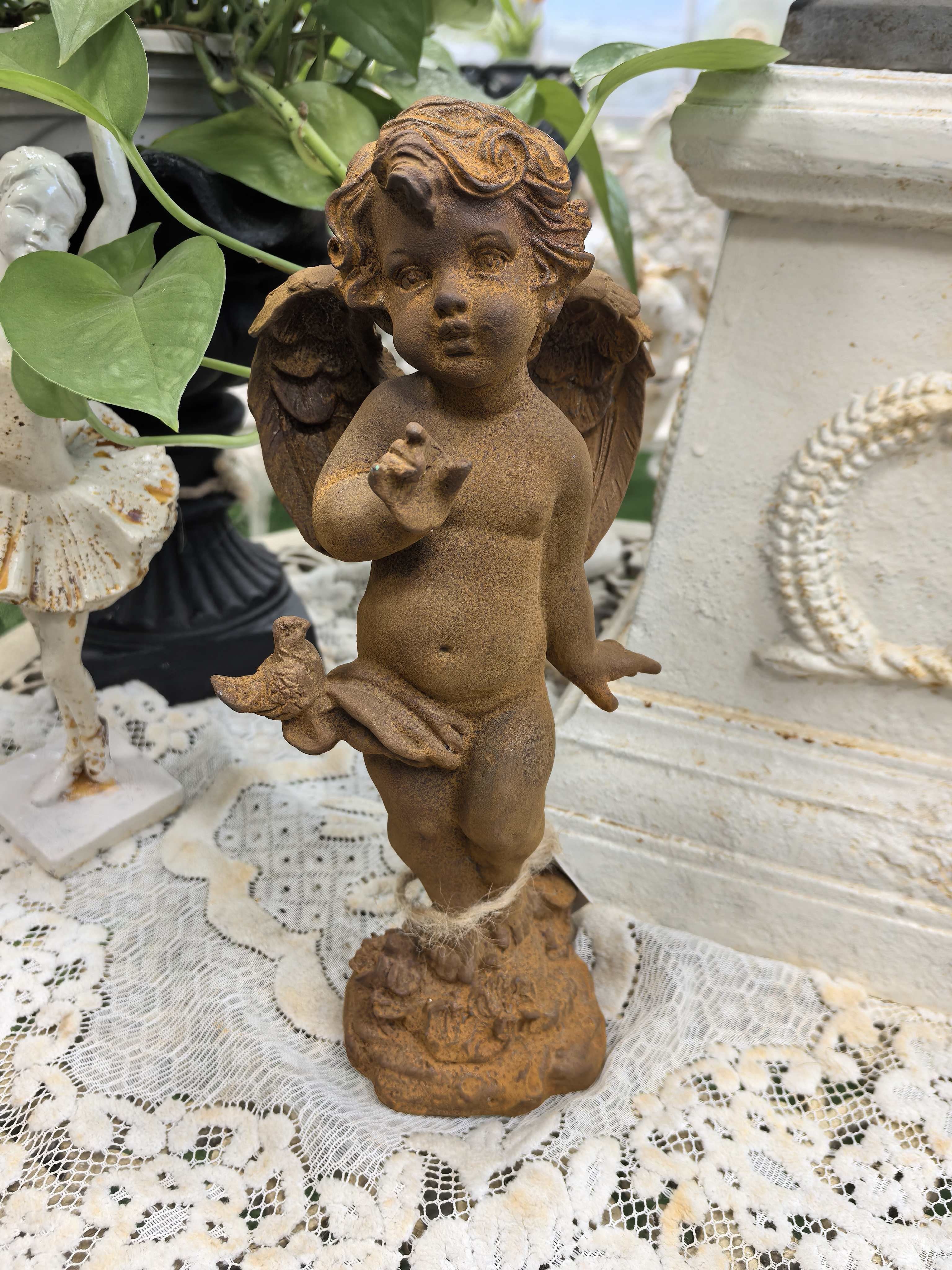 Rust-colored decorations, shy little bird angel