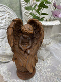 Rusty kneeling prayer angel