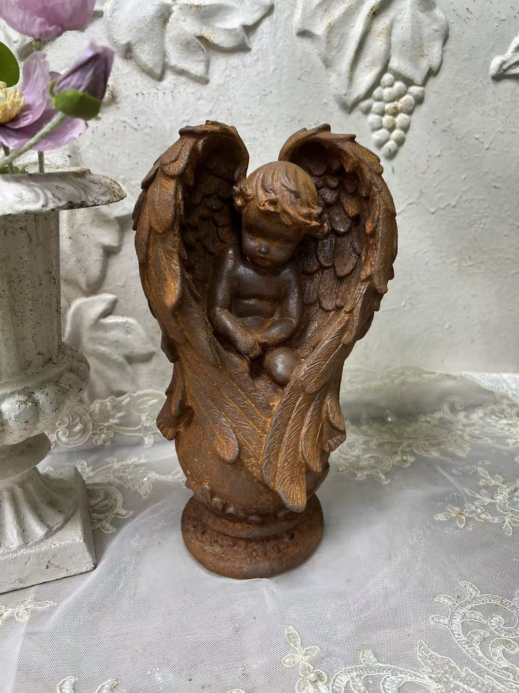 Rusty kneeling prayer angel